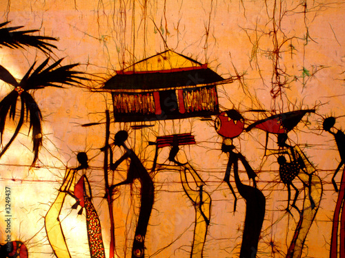 African art batik wall decoration with people and a hut.