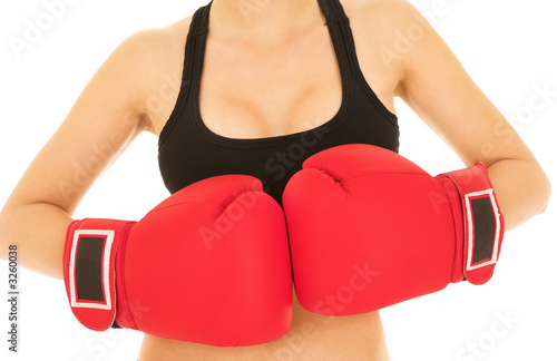 sexy caucasian kickboxer woman in gym clothes photo