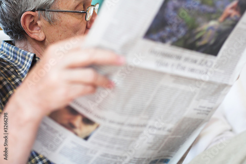 reading newspapers