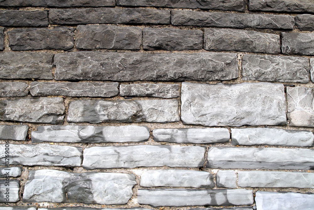 close up of an old sea wall in aberystwyth, wales.