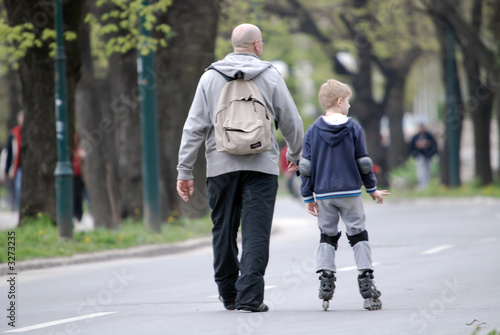 father and son walking