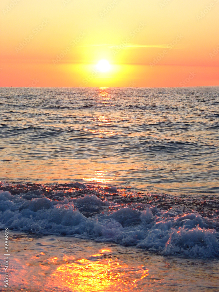 sunset sea waves