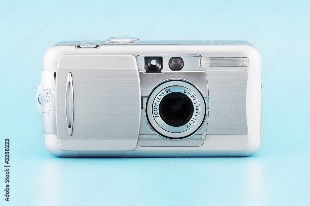 digital photo camera (isolated on blue) digital photo camera (isolated on blue)