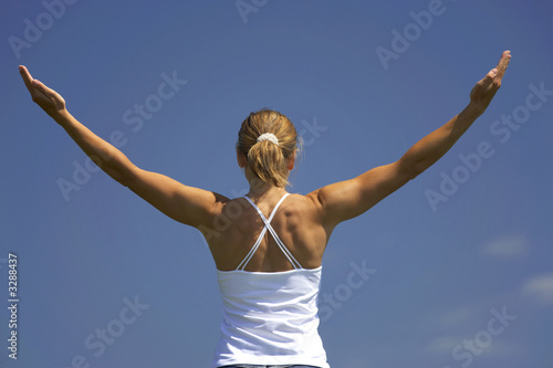 young woman exercising back
