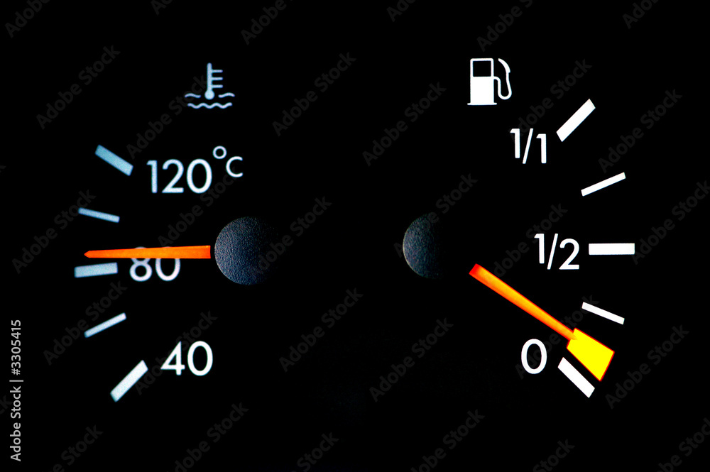 petrol and temperature meters on car dashboard petrol and temperature meters on car dashboard