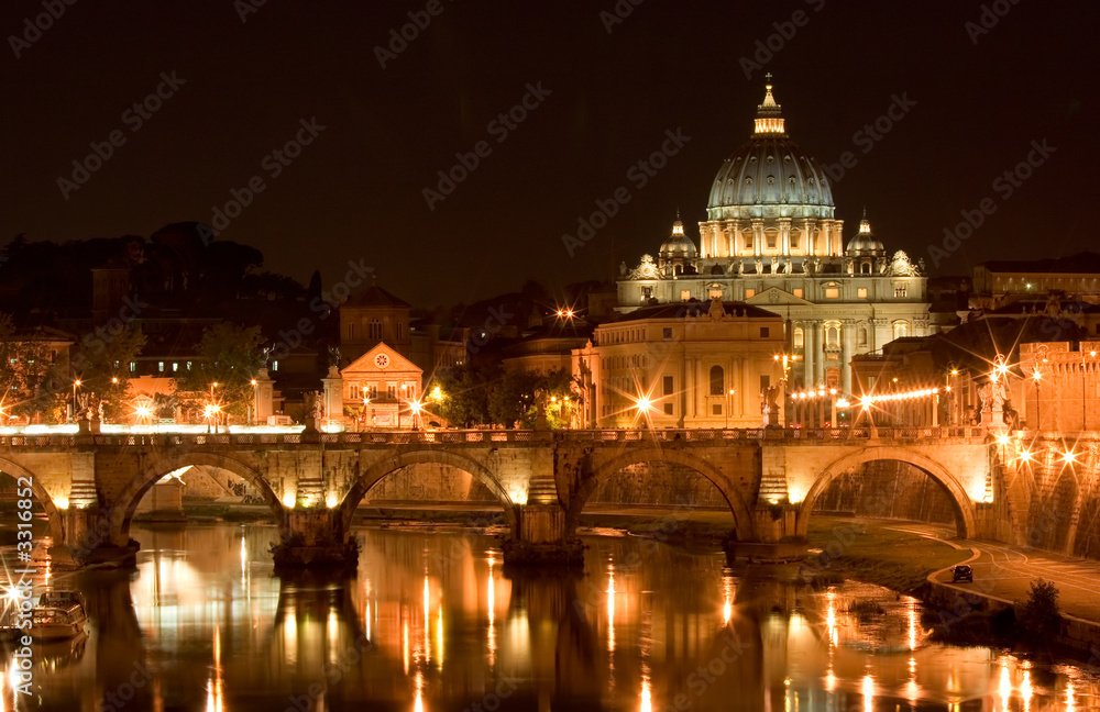 st. peter's basilica and a bridge on tiber river