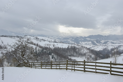 winter landscape with fence