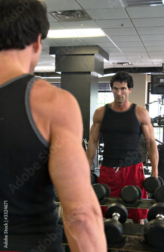 man exercising in mirror