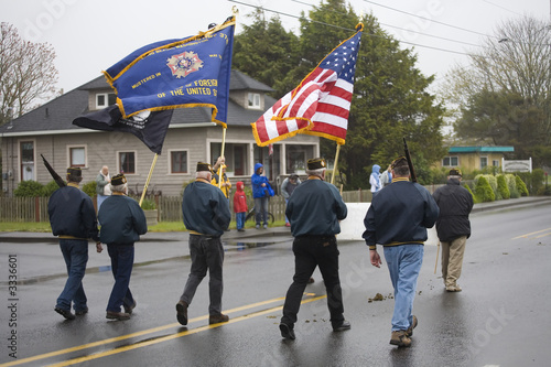 vfw color guard marching on a foggy day photo