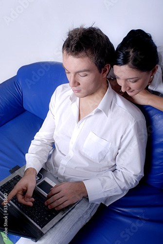Business couple with laptop