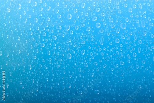 water drops on gradient blue background
