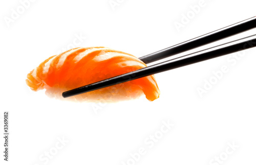 sushi with chopsticks shot on white