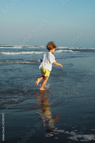 girl running in the ocean