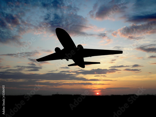 big plane over sunset