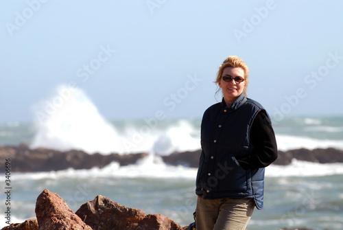 woman standing by sea