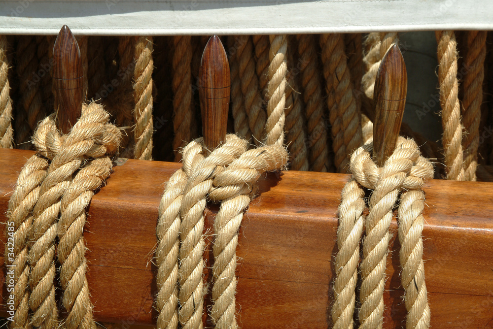 ropes hung on deck of sailboat