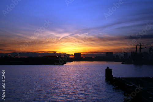 view of amsterdam harbour at sundown © Robert Hardholt
