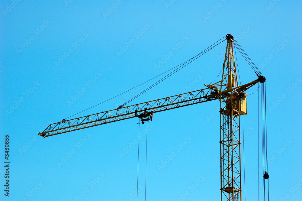 construction crane against blue sky