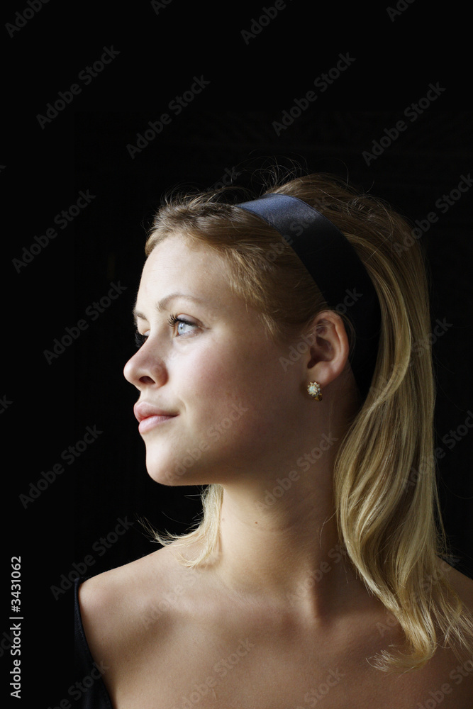 young woman with diamond and opel earings young woman with diamond and opel earings
