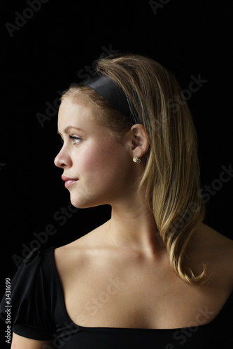 young woman with diamond and opel earings