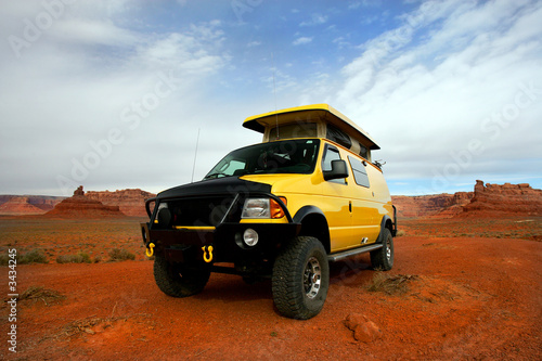 camping with yellow rv van