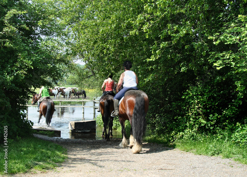 riders crossing a river