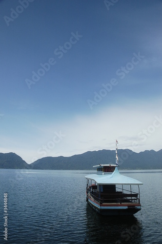 boat at maninjau lake , sumatra , indonesia