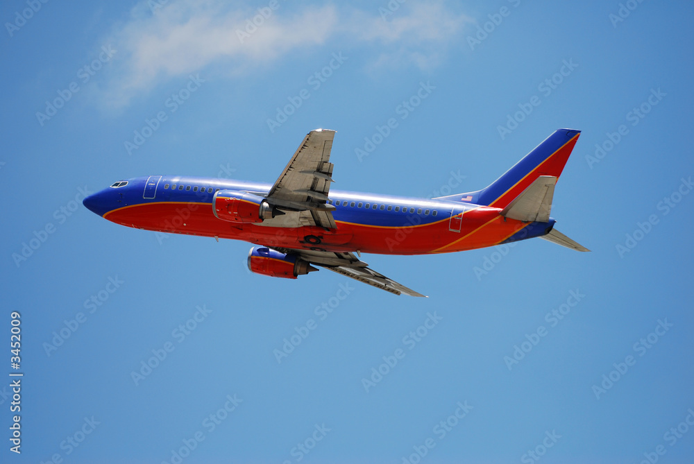 Fototapeta premium passenger jet taking off