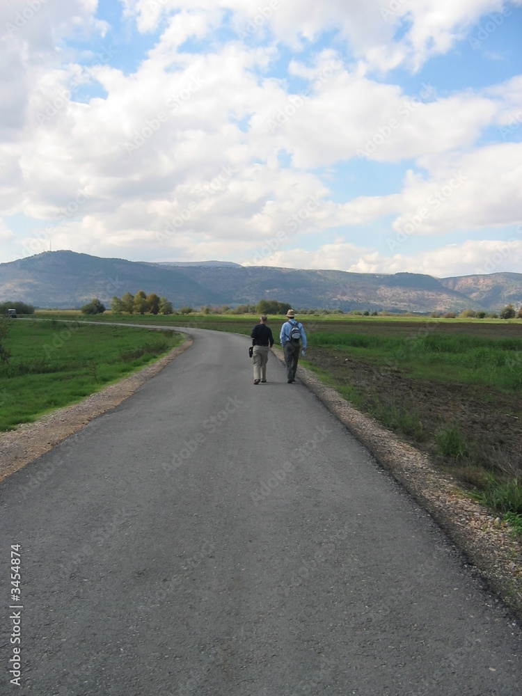 walking down the road, hula valley israel walking down the road, hula valley israel