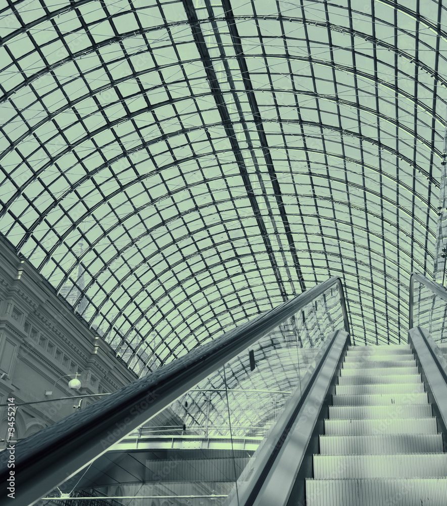 escalator in a shopping mall escalator in a shopping mall