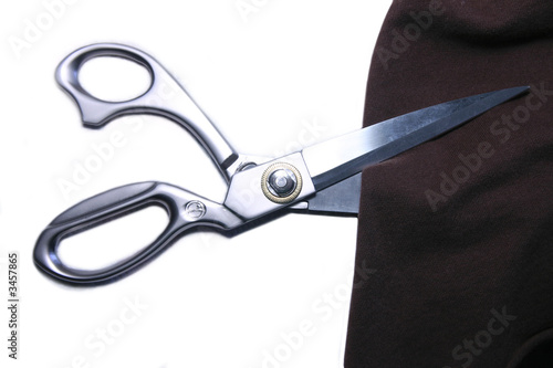 Taylor Scissors Cutting A Piece Of Cloth photo