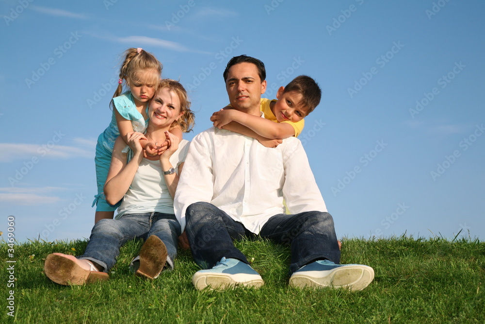 family on a grass