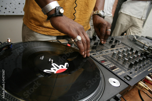 Bild auf Leinwand dj spining the record