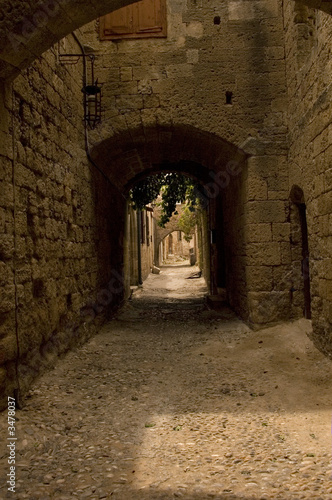 Fototapeta Naklejka Na Ścianę i Meble -  pebbly street of a medieval city