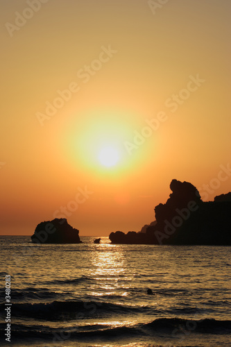 beautiful beach at sunset on corfu island  greece