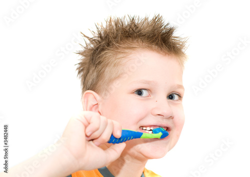 the boy cleaning teeth.