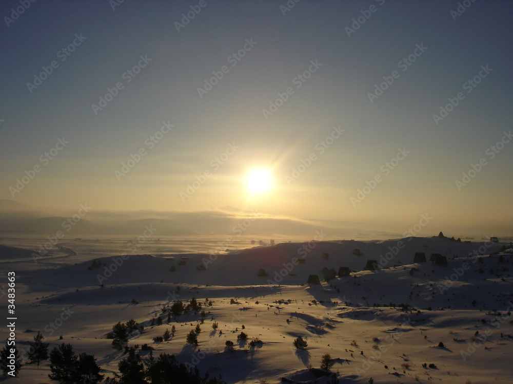 Naklejka premium dawn on snow