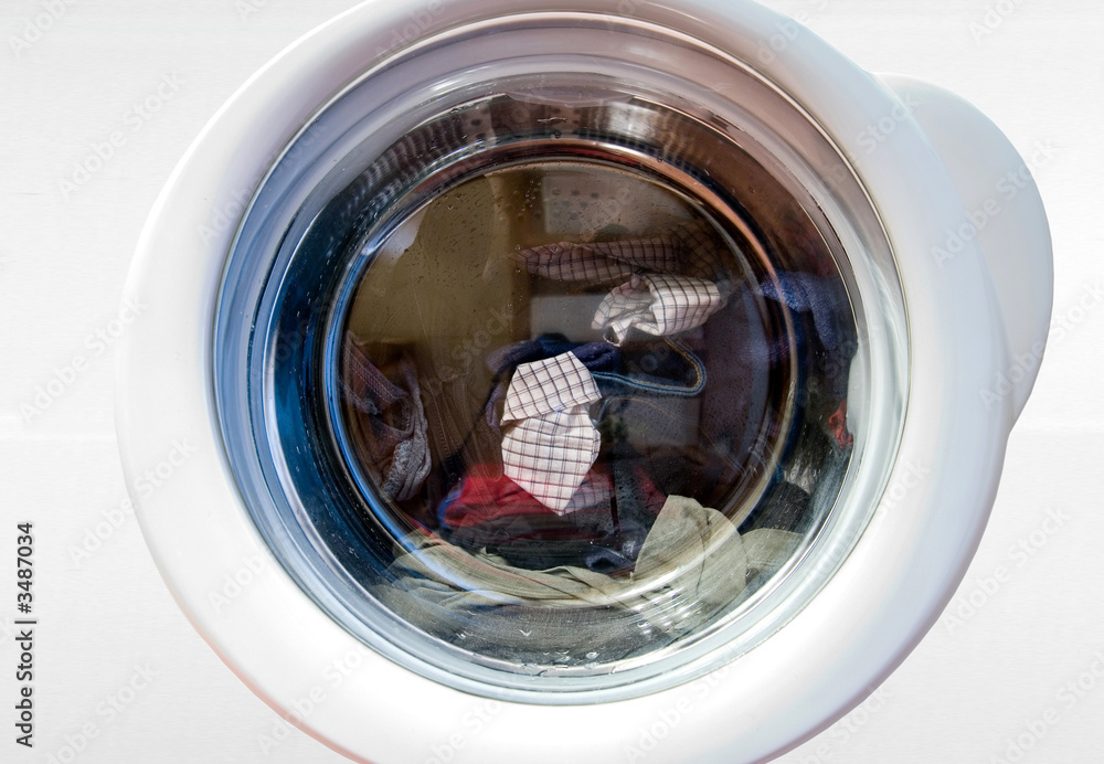 washing machine with loundry inside washing machine with loundry inside
