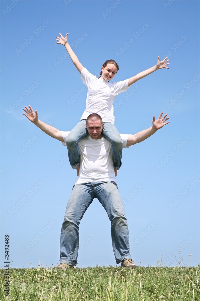 The girlfriend sits on the friend The girlfriend sits on the friend