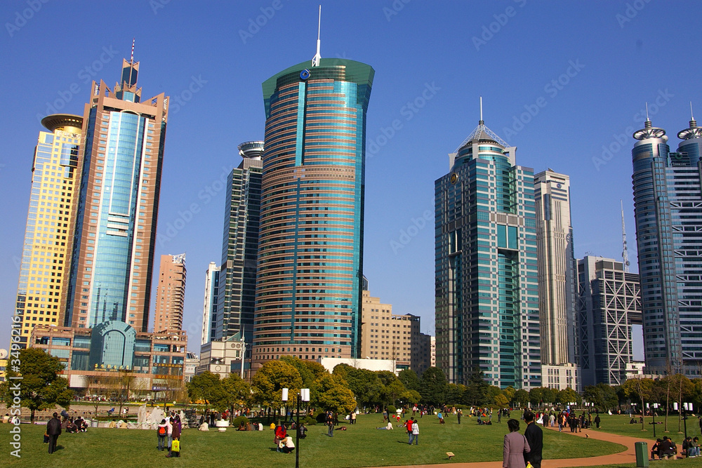 Fototapeta premium surrounded by modern skyscrapers in shanghai, china
