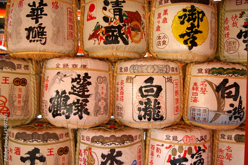 a traditional stack of japanese saki barrels 