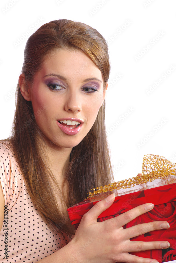 smiling woman holding a gift box