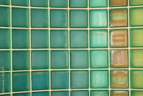 green glass wall in the town