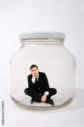 businessman locked in the jar