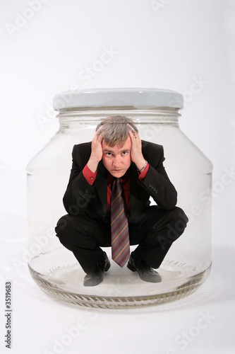 businessman locked in the jar