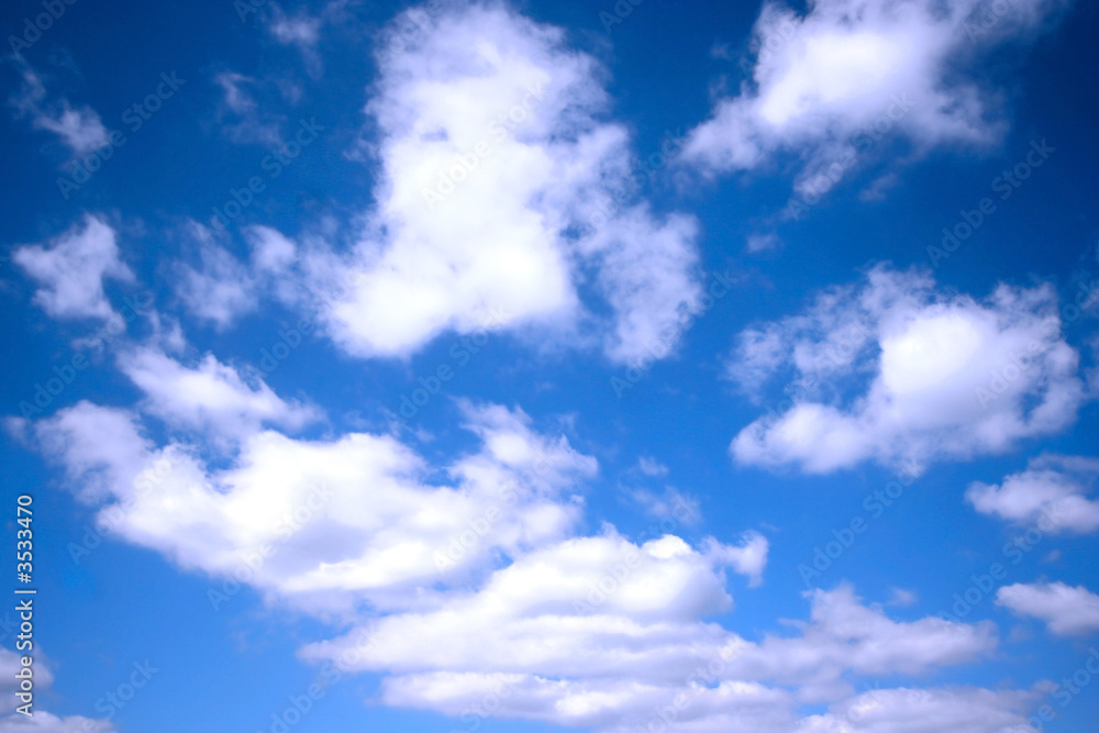 Fluffy clouds against blue sky Fluffy clouds against blue sky