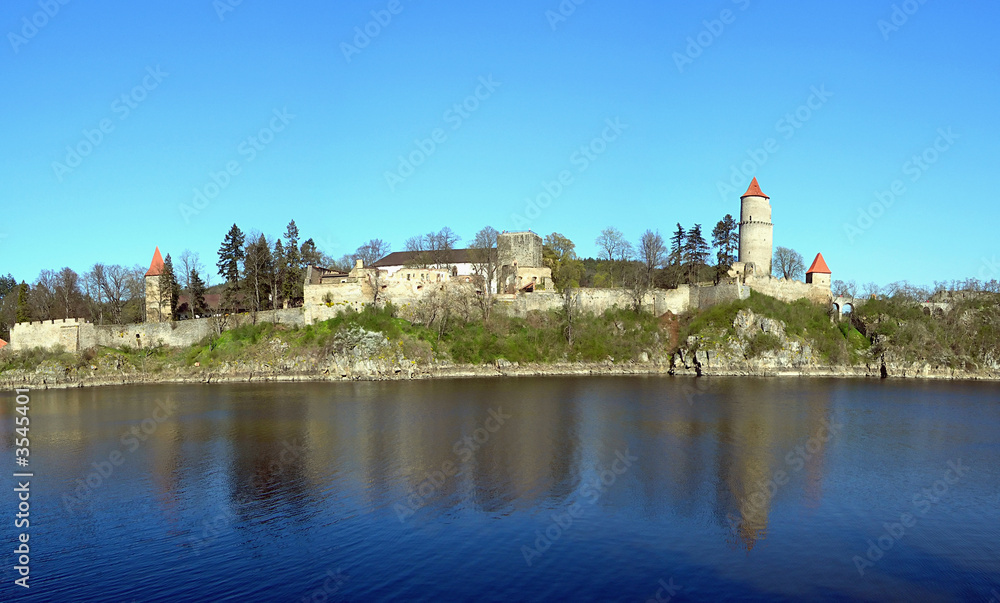 Old medieval czech castle with turrets, walls and a lake Old medieval czech castle with turrets, walls and a lake