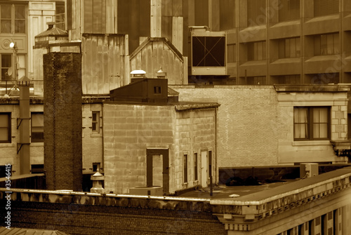 sepia image of roof top of old building in boston