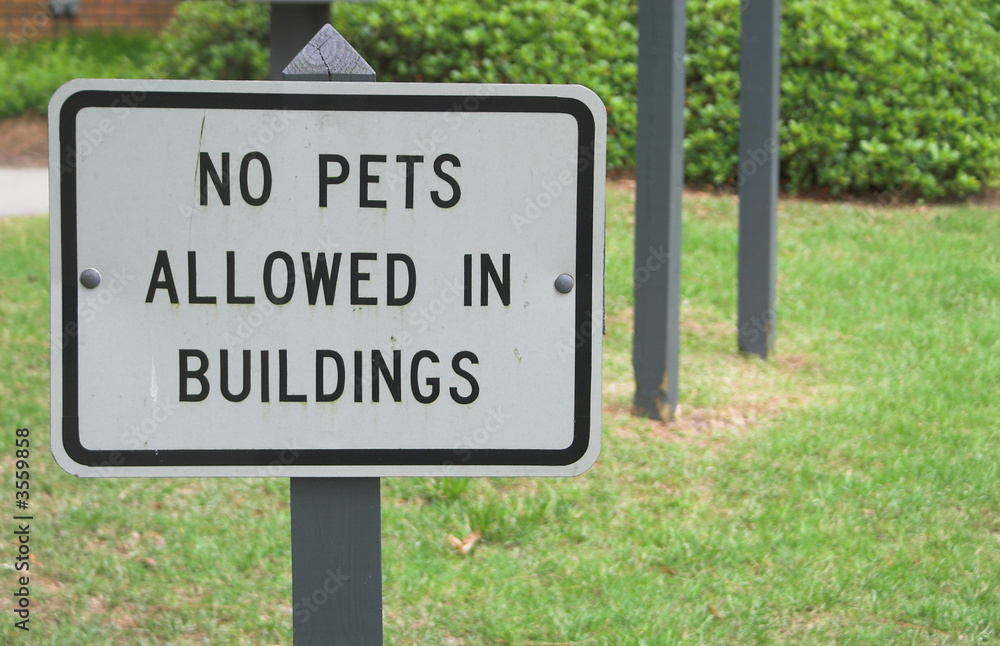 A sign stating No Pets Allowed In Building A sign stating No Pets Allowed In Building
