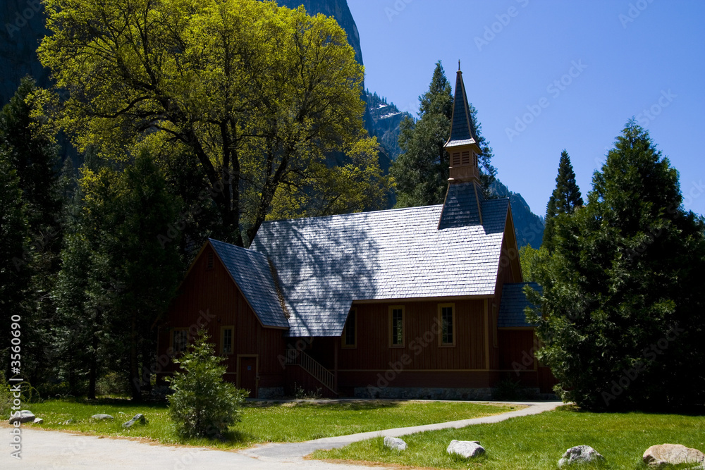 Chapel in yosemite national park at base of granite cliff Chapel in yosemite national park at base of granite cliff